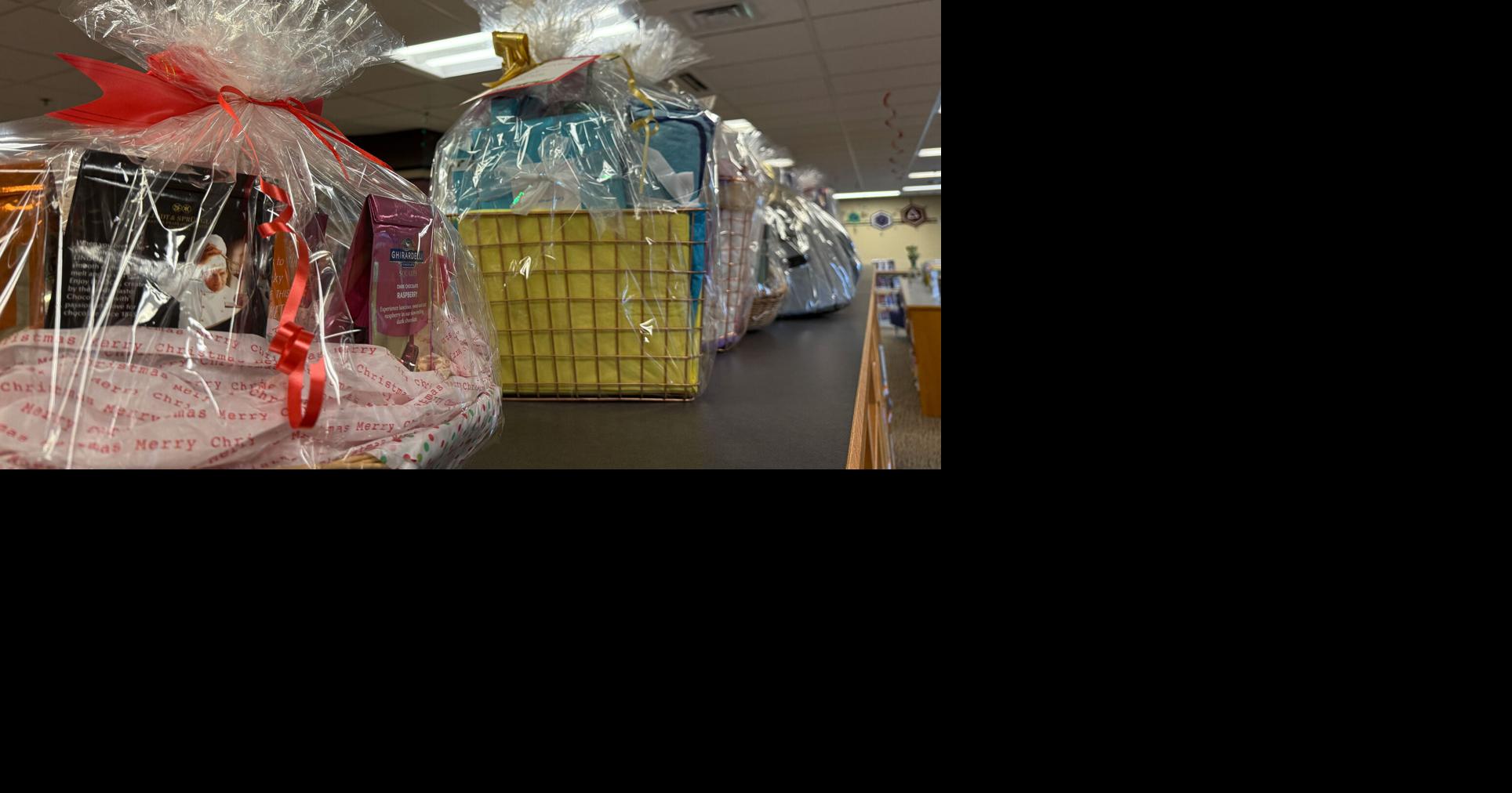 Friends of the Library roll out record 70 baskets for annual holiday raffle
