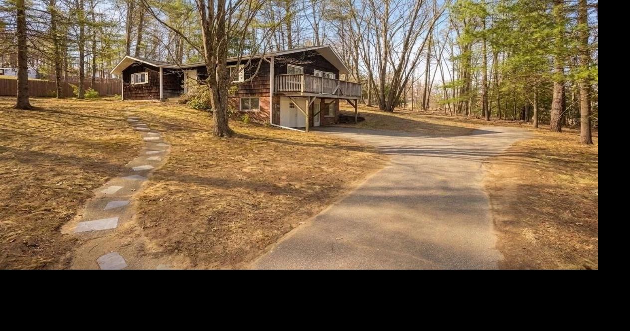 Home tour of the week: Explore this mid-century hillside ranch in Essex ...