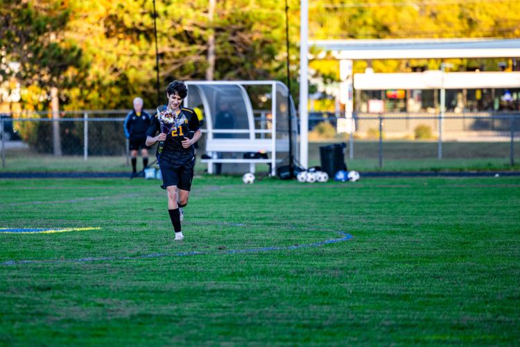 Milton Senior Eduardo Souza de Brito (21) enters the field at Milton High School's Homecoming Game vs Rice, Milton, Vermont on October 5, 2026.