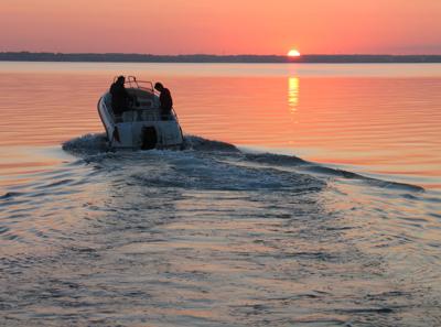 Speedboat in sunset