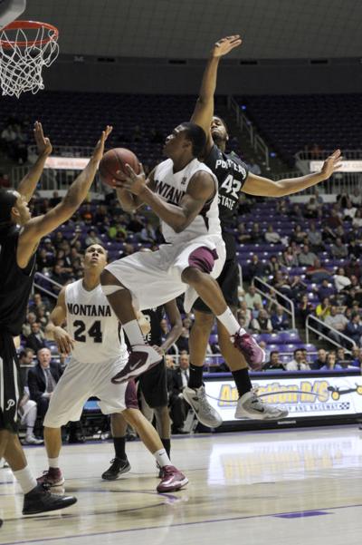 Montana To Hire Former Griz Travis Decuire As New Head Basketball