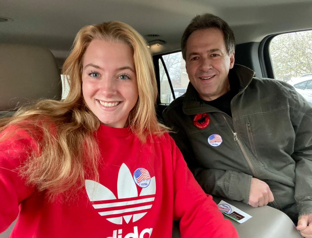 Steve Bullock and his daughter, Caroline, drop off their ...