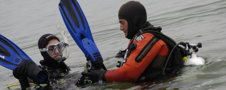 A reporter learns what it takes to scuba beneath the sea.  