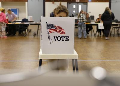 People cast their votes at the Oldemeyer Center during Election Day