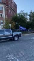 A Trump flag snatched off back of truck at Lee Circle