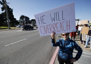 Image for display with article titled People March in Monterey to Protest Trump's Inauguration.