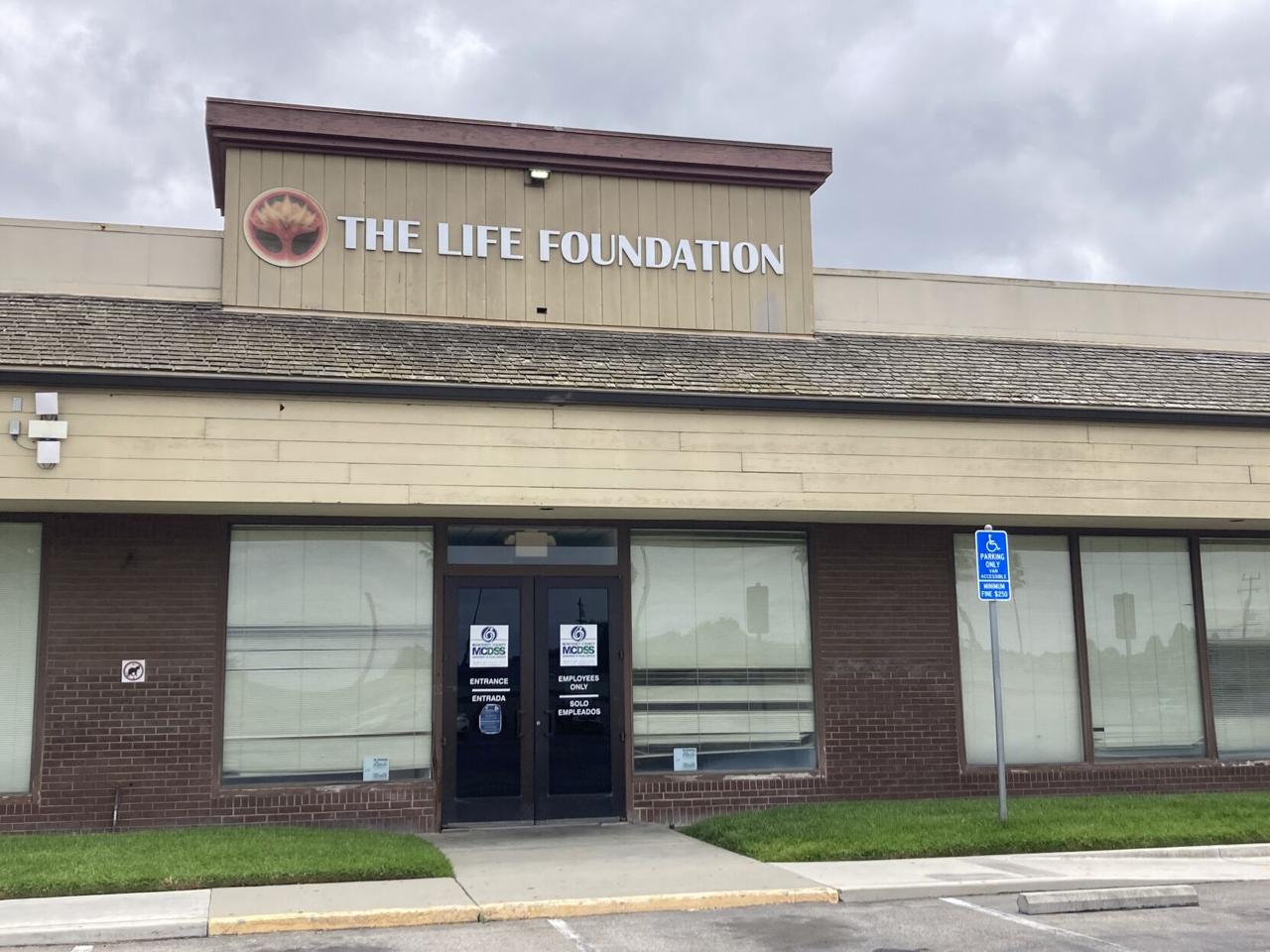 County and Life Foundation move toward a settlement in hope of closing a deal on a Social Services building.