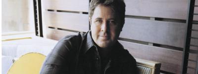 Country legend crosses genres to charm fans.  
