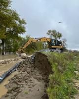 Emergency work on the Pajaro River levee continues; first phase is near completion.