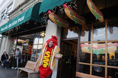 Domingo “Dingo” Rivera leads the people to the party – and tubes of Doggie Stylez meat.  