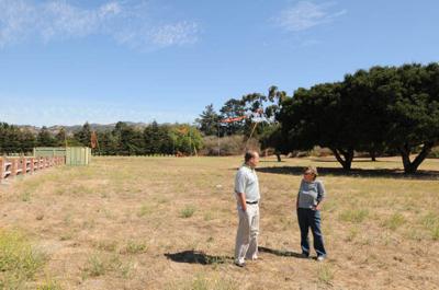 Activists sue county, supervisors and developer over retail development.  