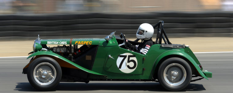 Classic and antiques zip through the turns at Laguna Seca.  