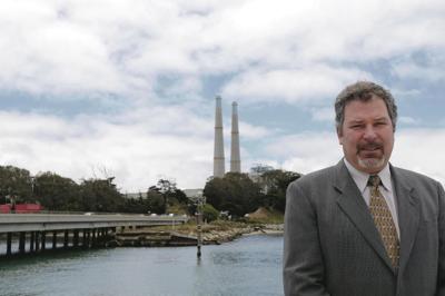 Dynegy battles Air District over fees as Moss Landing power plant gets greener.