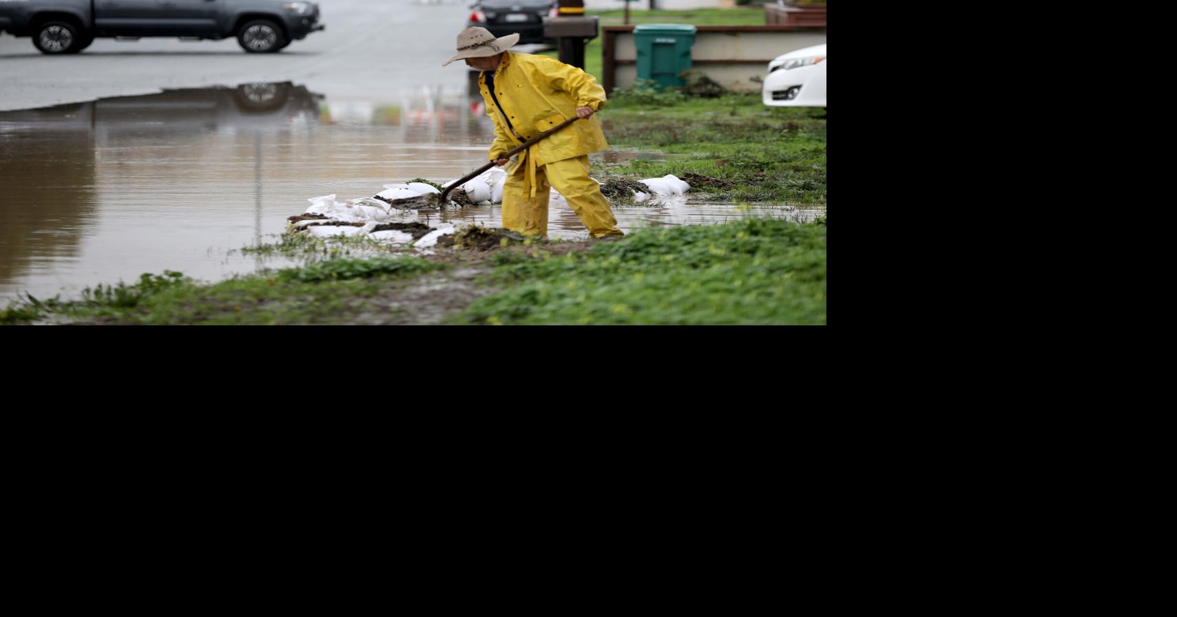 PHOTOS: Evacuation orders are widespread as rivers rise, but many ...