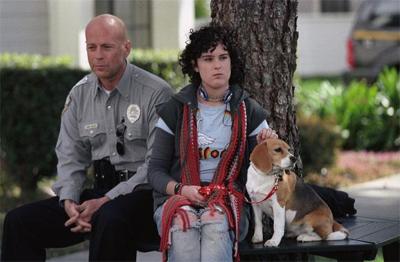 In <i>Hostage</i>, Bruce Willis plays a cop who saves the day—sound familiar?  