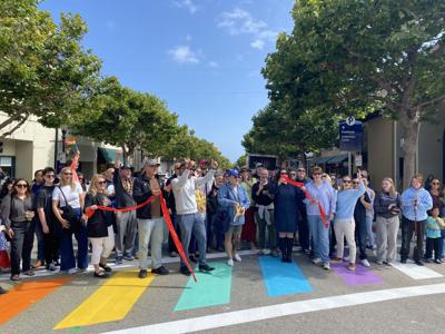 Rainbow crosswalk ribbon cutting