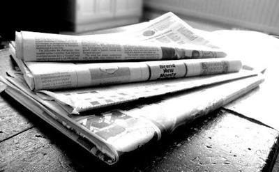 A stack of newspapers.