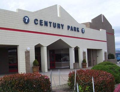 Developer pitches plan to demolish old theater and build shopping center.  