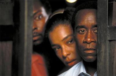 Actor Don Cheadle hits a career high with his portrayal of a sympathetic hotel manager during Rwanda’s ethnic conflict a decade ago.  