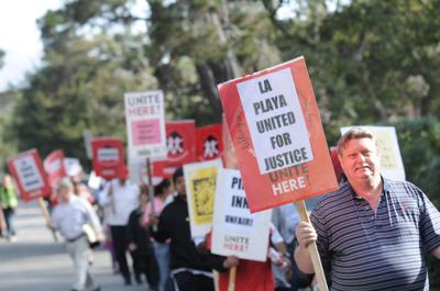 Labor disputes linger at three Carmel hotels; management calls on courts.  