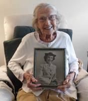 A 104-year-old veteran of service in the Navy quietly celebrates Veterans Day.