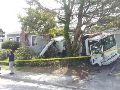 Street sweeper smashes into Monterey home.