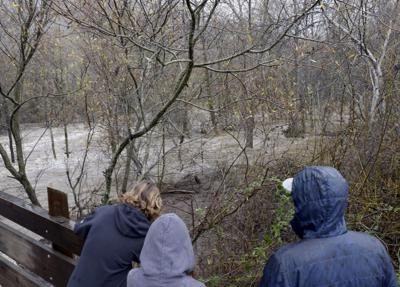 Bystanders watch Carmel River