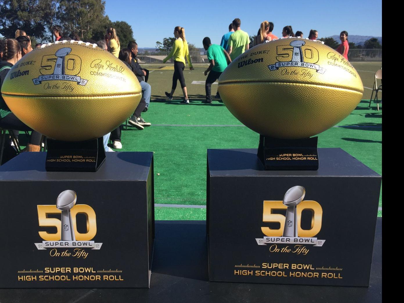 NFL great Herm Edwards gives Monterey High gold Super Bowl footballs, $10K., News