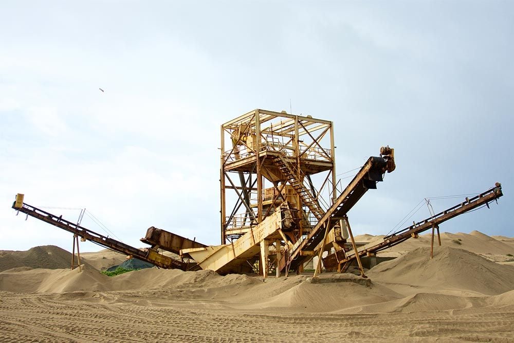 Cemex mine reflects human hunger for sand. | Cover