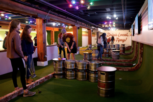 Image for display with article titled Tipsy Putt adds to Cannery Row’s growing lineup of interactive attractions.