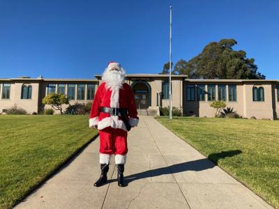 PK Diffenbaugh assisting Santa