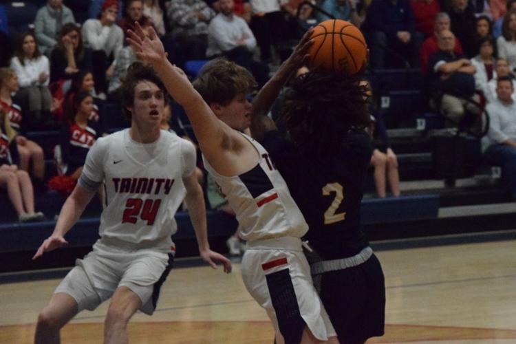 St. James controls the paint, Wildcats in area victory at Trinity