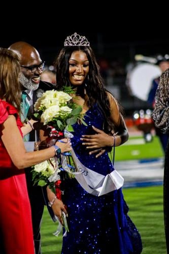Cheerleader Crowned Homecoming Queen in Patriot Victory, School