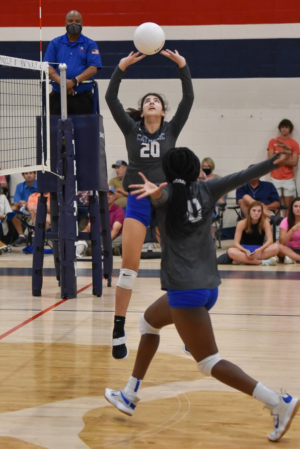 Catholic blends old young and new in chase for volleyball