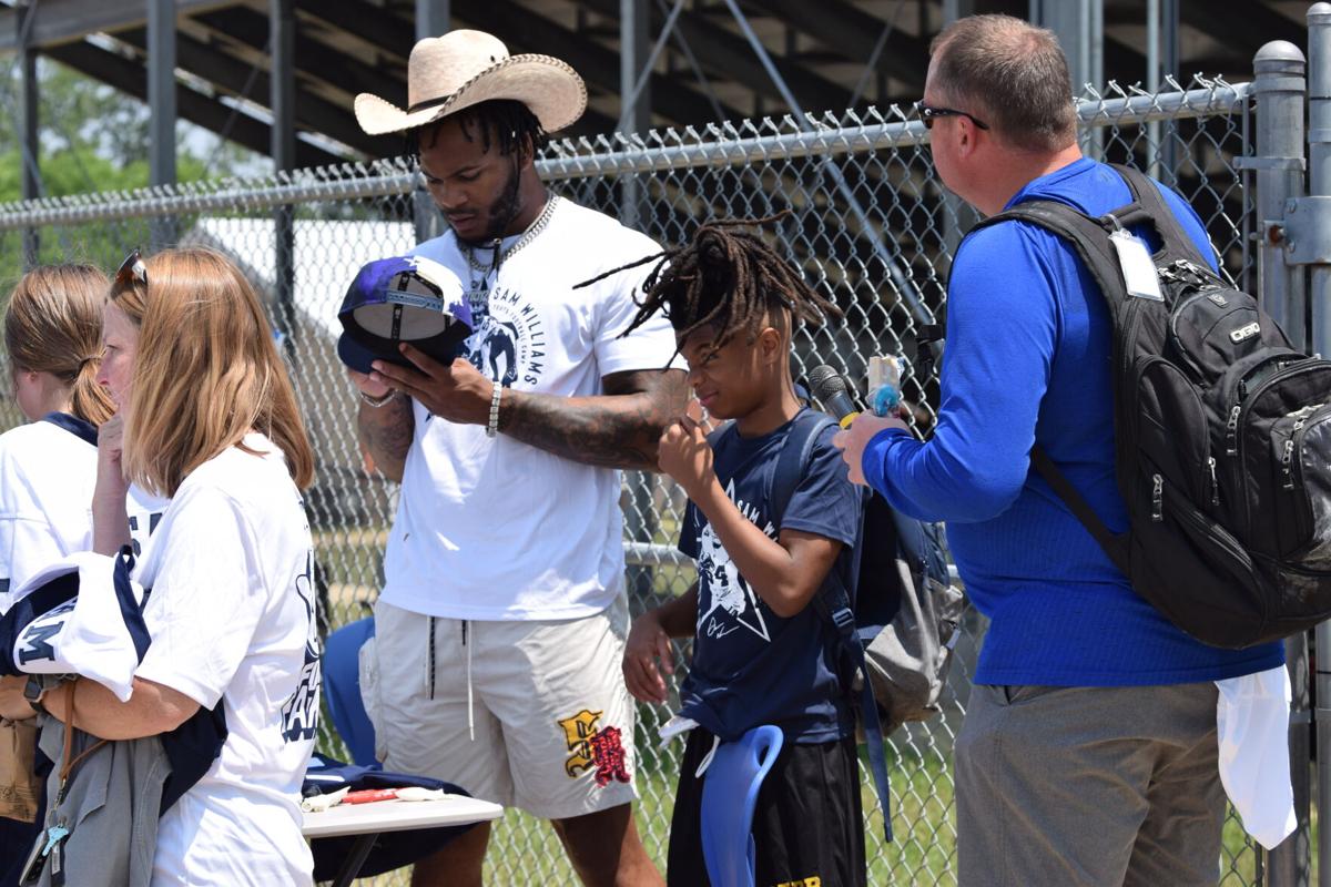 Former Marbury star returns to organize youth football camp, Sports