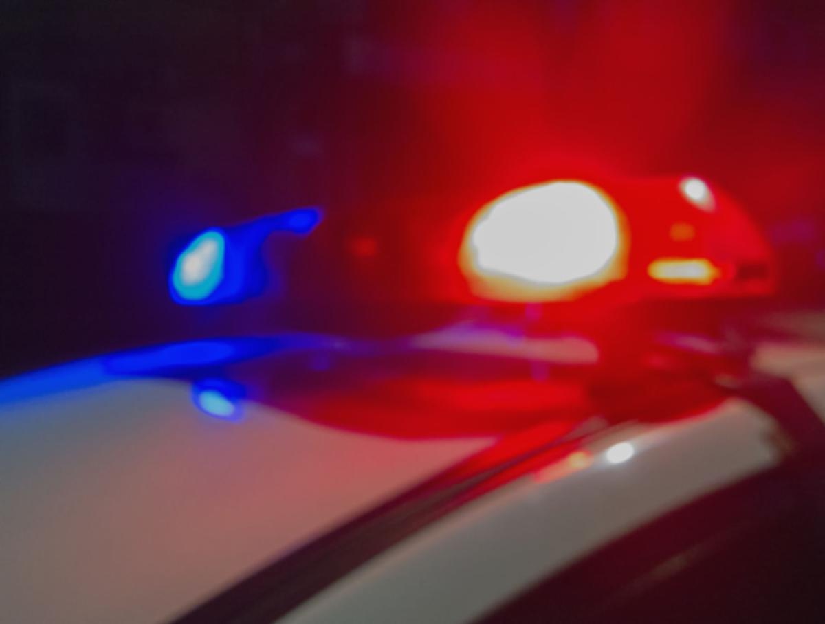Red and blue Lights of police car in night time