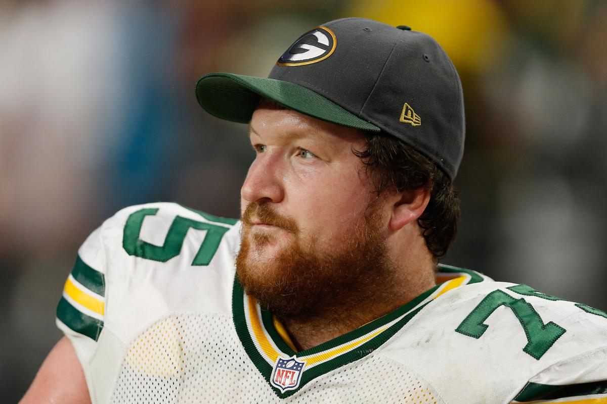 Tackle Bryan Bulaga #75 of the Green Bay Packers on the sidelines during the NFL game against the Arizona Cardinals at the University of Phoenix Stadium on Dec. 27, 2015 in Glendale, Ariz.