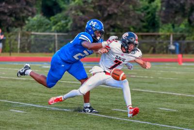 Mooresville dominates Davie in their Coach Mayo s debuts