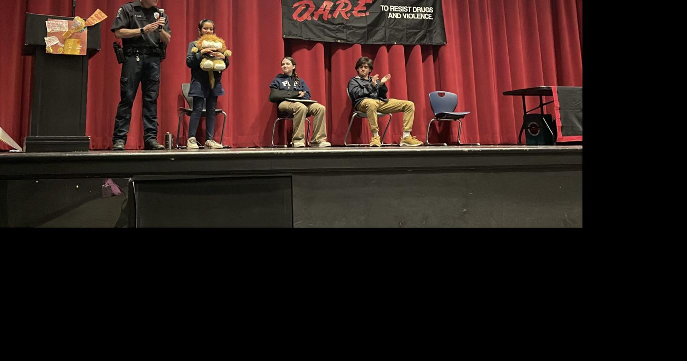 Fifth graders at PLP celebrate graduation from DARE program