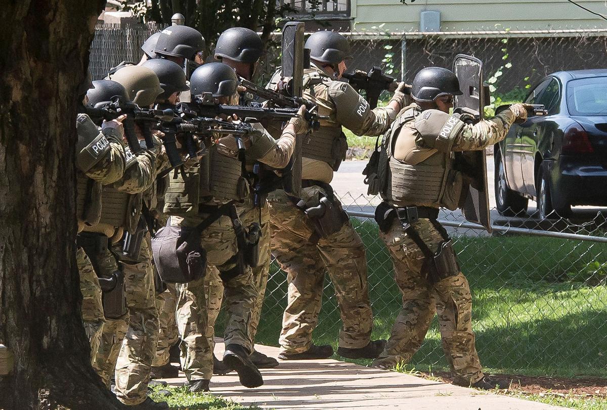 PHOTOS: Police raid house on the Southside of Statesville ...
