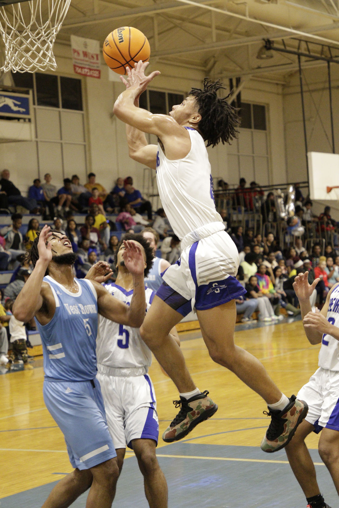 HIGH SCHOOL BASKETBALL: Fields scores 31; Statesville claims NPC title ...