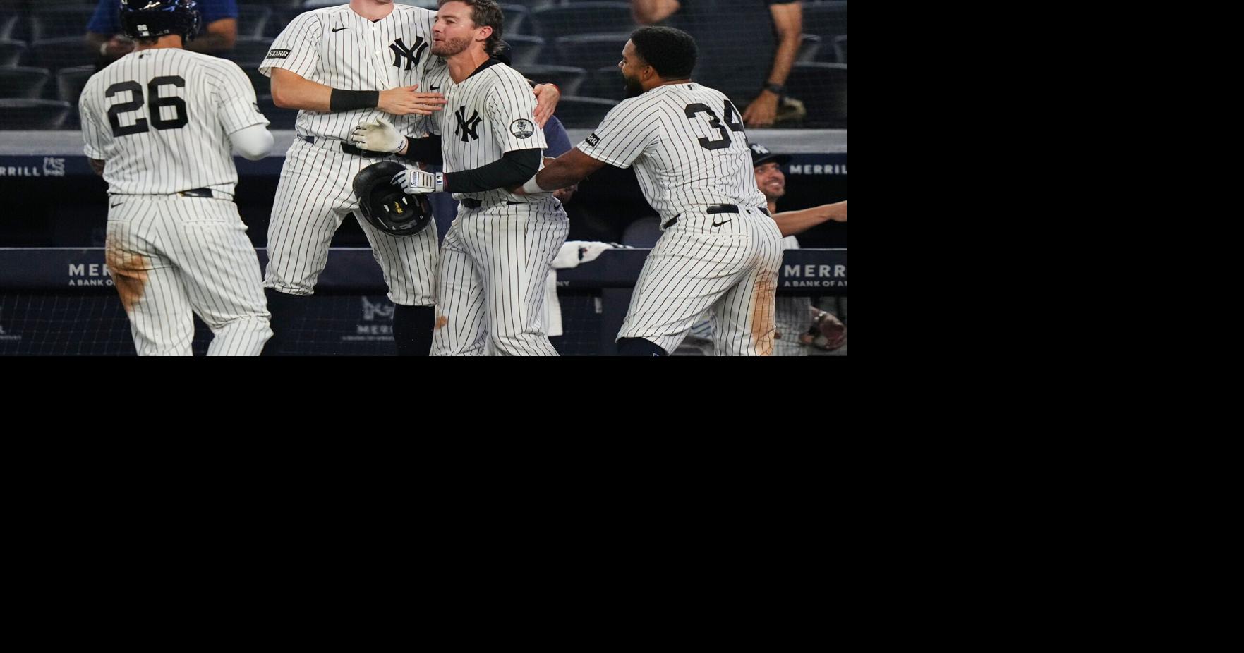 Yankees stun Braves with 9th-inning rally, walk-off in 10th