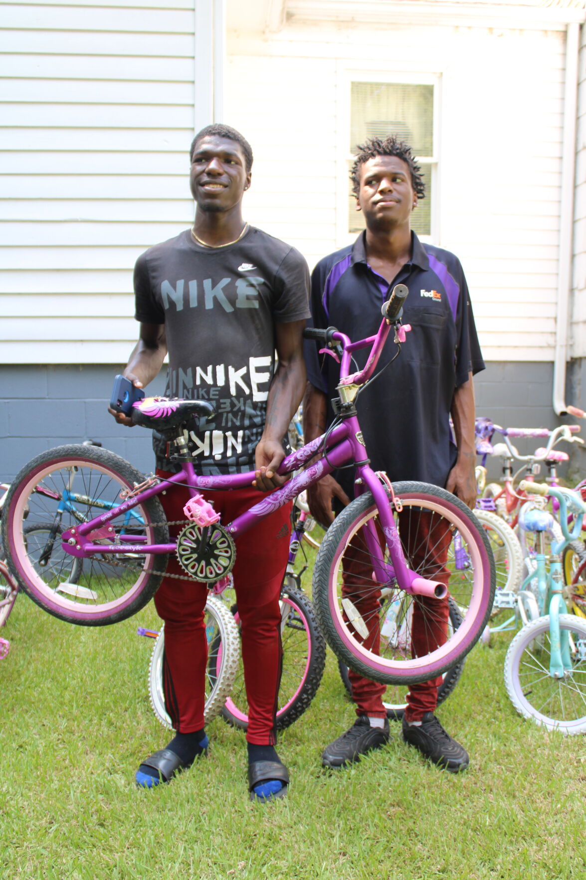 Brother picks bike for little sister
