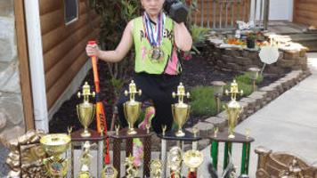 Eleven Year Old Powerlifter Finds Self Confidence Success In