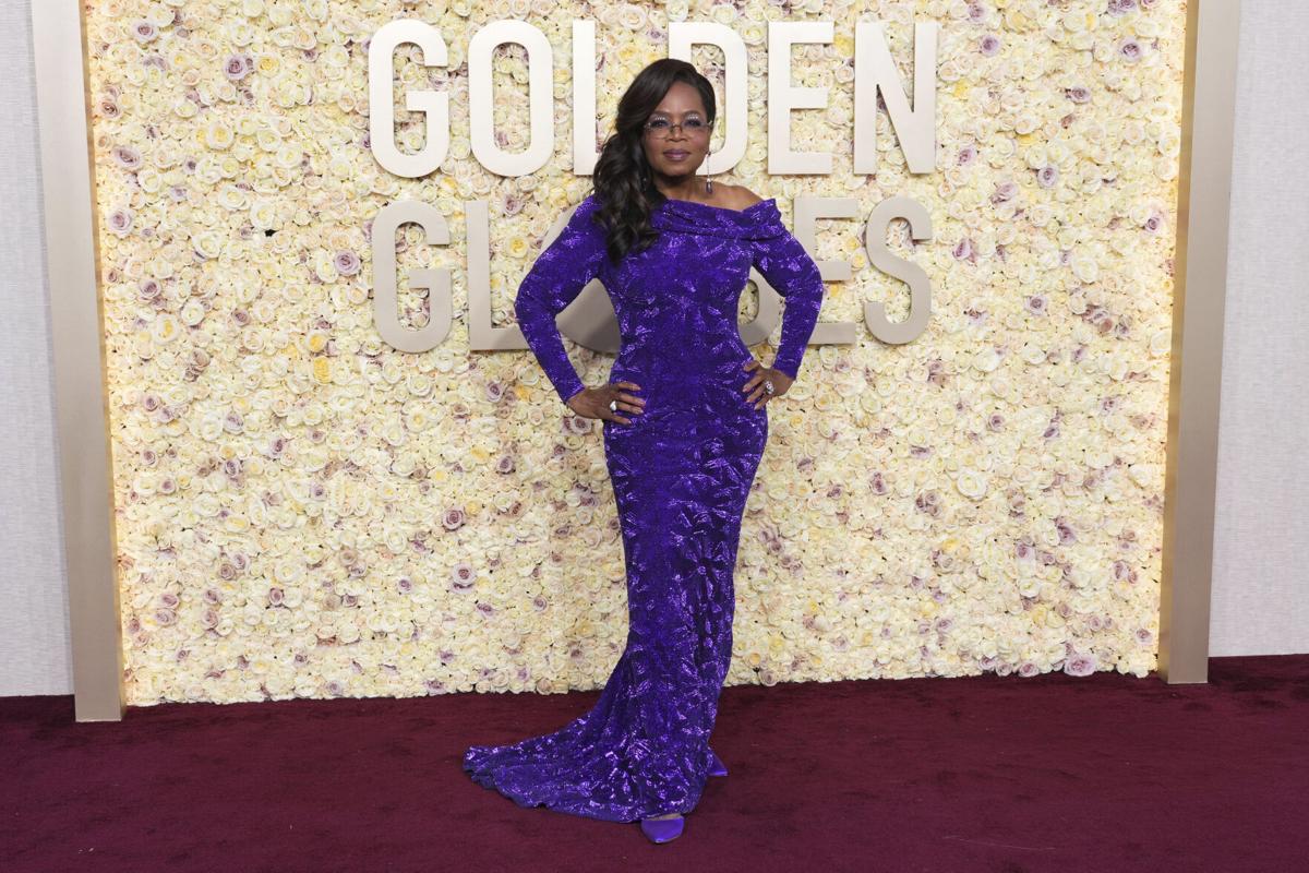 Oprah Stuns In Purple on Golden Globes Red Carpet