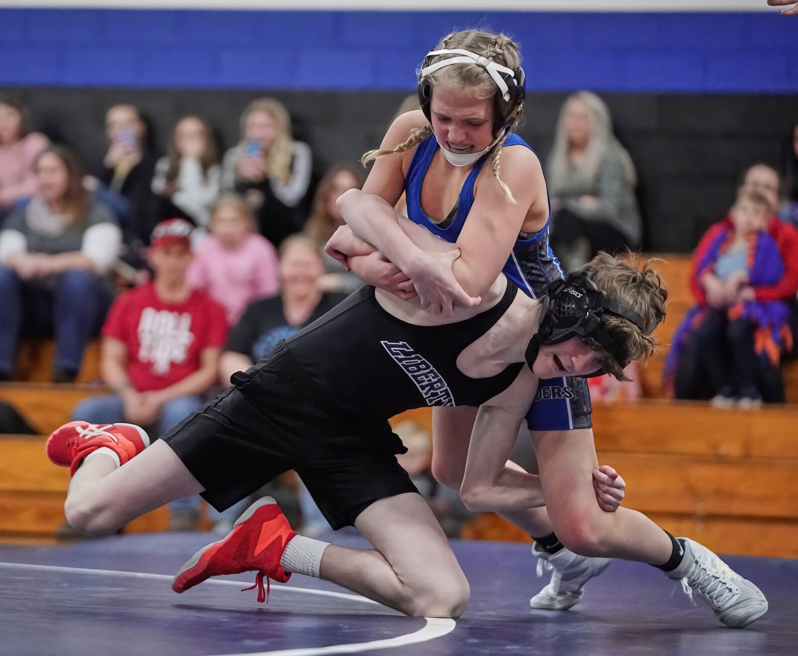 LOCAL ROUNDUP EBMS wrestling tops Liberty 50-42 image picture