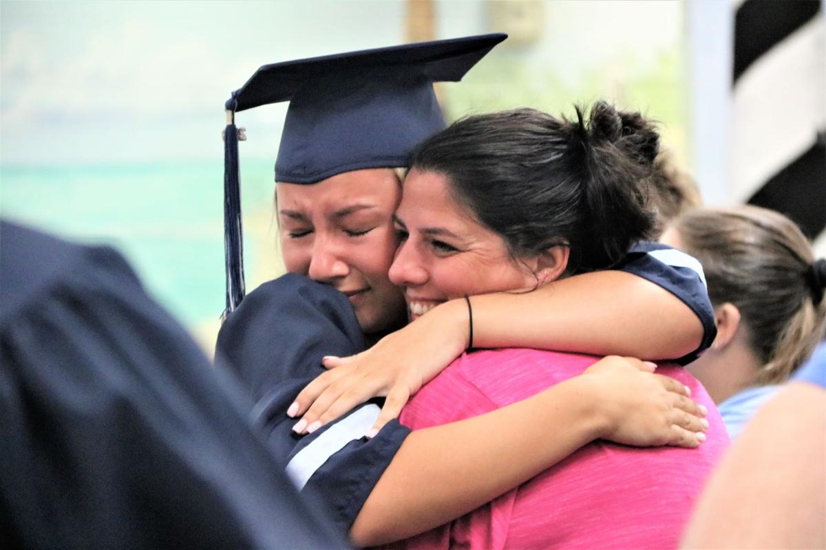 Students participate in ‘senior walk’ at former elementary schools