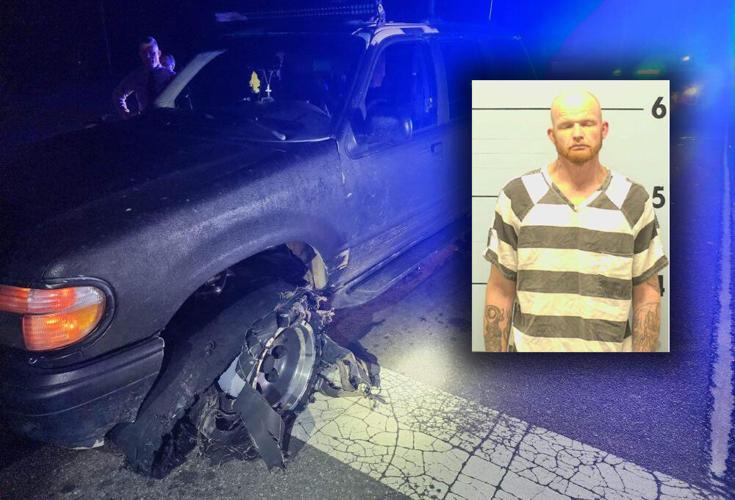 Chase ends with vehicle on rims, man behind bars