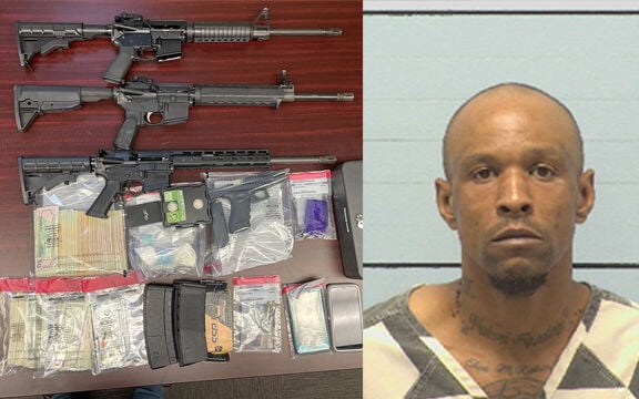 Guns, drugs and cash seized after warrant served