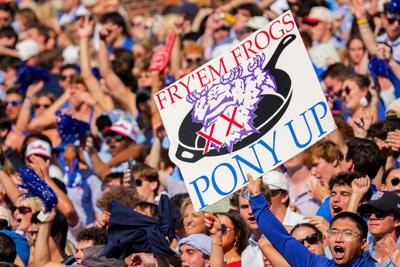 SMU fans cheer a score during the first half of an NCAA football game against TCU at Ford Stadium on Saturday, Sept. 21, 2024, in Dallas.